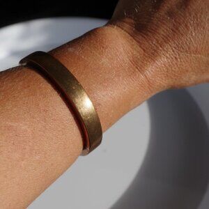 Women`s copper hinged clamper bracelet.